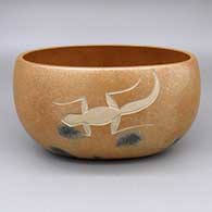 Micaceous gold oval shaped bowl with fire clouds and a sgraffito lizard design
 by Robert Vigil of Nambe