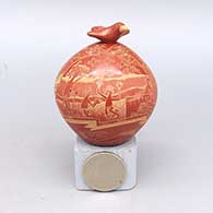Miniature red lidded jar with sgraffito people, pueblo, Mimbres bird, and geometric design, with matching bird lid
 by Susan Romero of Santa Clara
