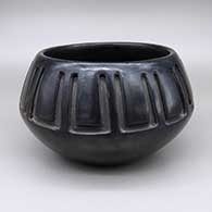 Black jar with a carved feather ring geometric design
 by Christina Naranjo of Santa Clara