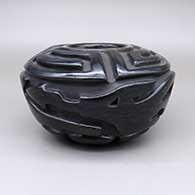 Black jar with a sgraffito and carved avanyu and geometric design
 by Gwen Tafoya of Santa Clara