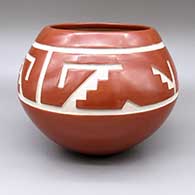 Red jar with a carved kiva step and geometric design
 by Daryl Whitegeese of Santa Clara and Pojoaque