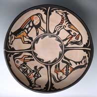 Polychrome dough bowl decorated with a 4-panel horse and geometric design inside and a geometric design outside
 by Robert Tenorio of Santo Domingo