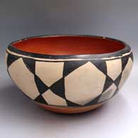 Polychrome dough bowl polished inside and with a geometric design around the outside
 by Unknown of Santo Domingo