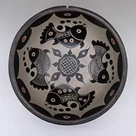 Large polychrome dough bowl with a fish, checkerboard, and geometric design
 by Thomas Tenorio of Santo Domingo