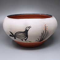 A polychrome bowl with a three-panel bird and cactus design around the outside
 by Arthur Coriz of Santo Domingo