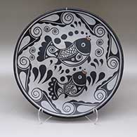 Polychrome plate with a fish and geometric design
 by Thomas Tenorio of Santo Domingo