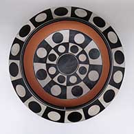 Large polychrome bowl with a geometric design on inside and outside
 by Thomas Tenorio of Santo Domingo