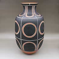 Large polychrome jar with a flared opening and a traditional Kewa design featuring geometric elements
 by Thomas Tenorio of Santo Domingo