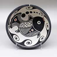 Polychrome bowl with a fish and wave geometric design
 by Thomas Tenorio of Santo Domingo