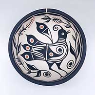 Polychrome bowl with a bird, flower, and geometric design
 by Thomas Tenorio of Santo Domingo