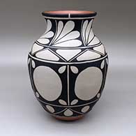 Polychrome jar with a flared opening and six-panel geometric design
 by Thomas Tenorio of Santo Domingo