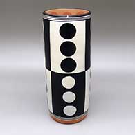 Polychrome cylinder with a geometric design
 by Thomas Tenorio of Santo Domingo