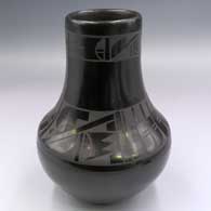 Black-on-black jar with 2 bands of geometric design above the shoulder
 by Erik Fender of San Ildefonso