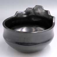 Black bowl with a stepped rim polished inside and out
 by Russell Sanchez of San Ildefonso
