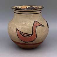 Polychrome jar with flared lip and bird and geometric design
 by Unknown of San Ildefonso