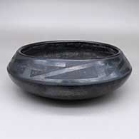 Black-on-black bowl with a geometric design
 by Tonita Roybal of San Ildefonso
