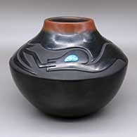 Black jar with a sienna rim, a carved avanyu design, and an inlaid turquoise stone detail
 by Dora Tse Pe of San Ildefonso