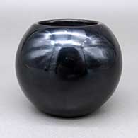 Small polished black jar
 by Maria Martinez of San Ildefonso