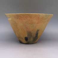 Micaceous gold bowl with geometric cut out and fire clouds, click or tap to see a larger version