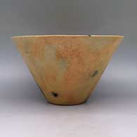 Micaceous gold bowl with geometric cut out and fire clouds, click or tap to see a larger version