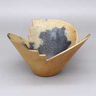 Micaceous gold journey bowl with a geometric cut opening and fire clouds
 by Angie Yazzie of Taos