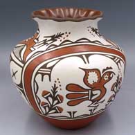 Polychrome jar with a pie crust rim and a roadrunner, rainbow, butterfly, cloud formation and geometric design
 by Ruby Panana of Zia