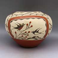 Polychrome jar with a bird, berry, branch, and geometric design, click or tap to see a larger version
