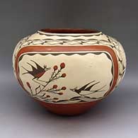 Polychrome jar with a bird, berry, branch, and geometric design
 by Kathy Pino of Zia