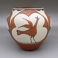 Polychrome jar with a four panel roadrunner and geometric design
 by Unknown of Zia