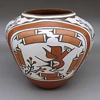 Polychrome jar with a roadrunner, flower, and geometric design
 by Ruby Panana of Zia
