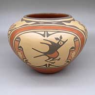 Polychrome jar with a roadrunner, flower, and geometric design
 by Ruby Panana of Zia