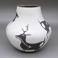 Black and white jar with a deer with heart line design
 by Alan Lasiloo of Zuni