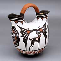 A polychrome wedding vase with a four-panel deer-in-his-house, rosette and geometric design
 by Carlos Laate of Zuni