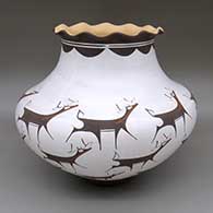 Polychrome jar with a pie crust rim and a deer-with-heart-line and geometric design
 by Anderson Peynetsa of Zuni