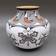Polychrome jar with a flared opening and a butterfly, turtle, and geometric design
 by Anderson Jamie Peynetsa of Zuni