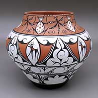 Polychrome jar with a deer-with-heart-line, frog, tadpole, spiral, and geometric design
 by Priscilla Peynetsa of Zuni
