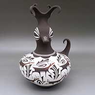 Polychrome duck jar with a deer-with-heart-line and geometric design
 by Anderson Peynetsa of Zuni