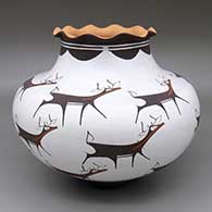 Polychrome jar with a pie crust opening and a deer-with-heart-line and geometric design
 by Anderson Peynetsa of Zuni