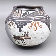 Polychrome jar with a traditional Zuni design featuring deer-with-heart-line, fine line, and geometric elements
 by Unknown of Zuni