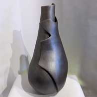 Micaceous black sculptural piece
