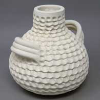 White corrugated jar with handles