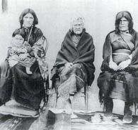 Four generations of the Nampeyo family: Rachel sitting in Annie's lap, next to White Corn, Nampeyo's mother, and Nampeyo herself