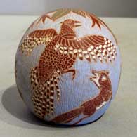 Sgraffito nature design on a polychrome seed pot by Camilio Tafoya