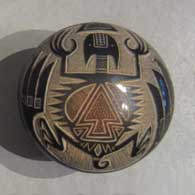 Sgraffito design on a seed pot