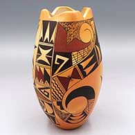 Polychrome jar with a bird element and geometric design