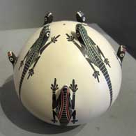 Lizard motif on a polychrome seedpot