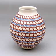 A polychrome jar decorated with painted bands of geometric design