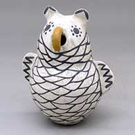 A polychome owl figure