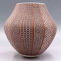 Polychrome jar with panels of geometric design