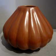 A red melon jar